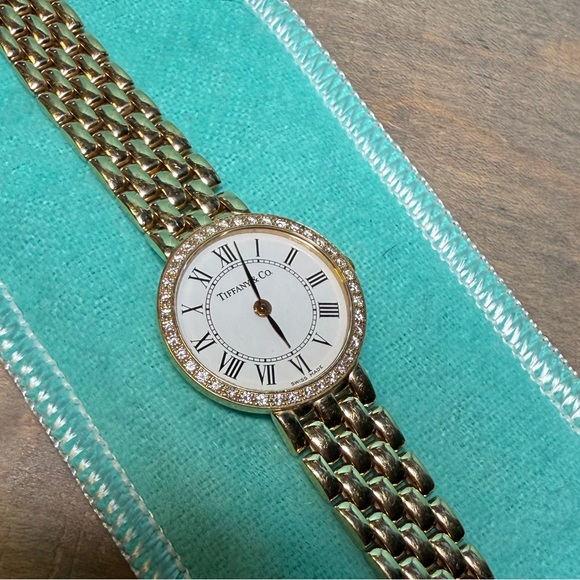 Vintage Tiffany & Co. ladies 14k yellow gold watch with diamonds around bezel. - Picture 8 of 12